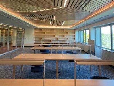 beautiful hall with side windows and tables placed in hall